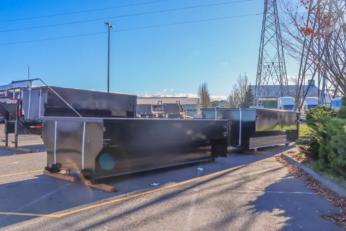 Roll-off dumpster ready for waste disposal at job site for 10 Yard Dumpster Rental in Livonia